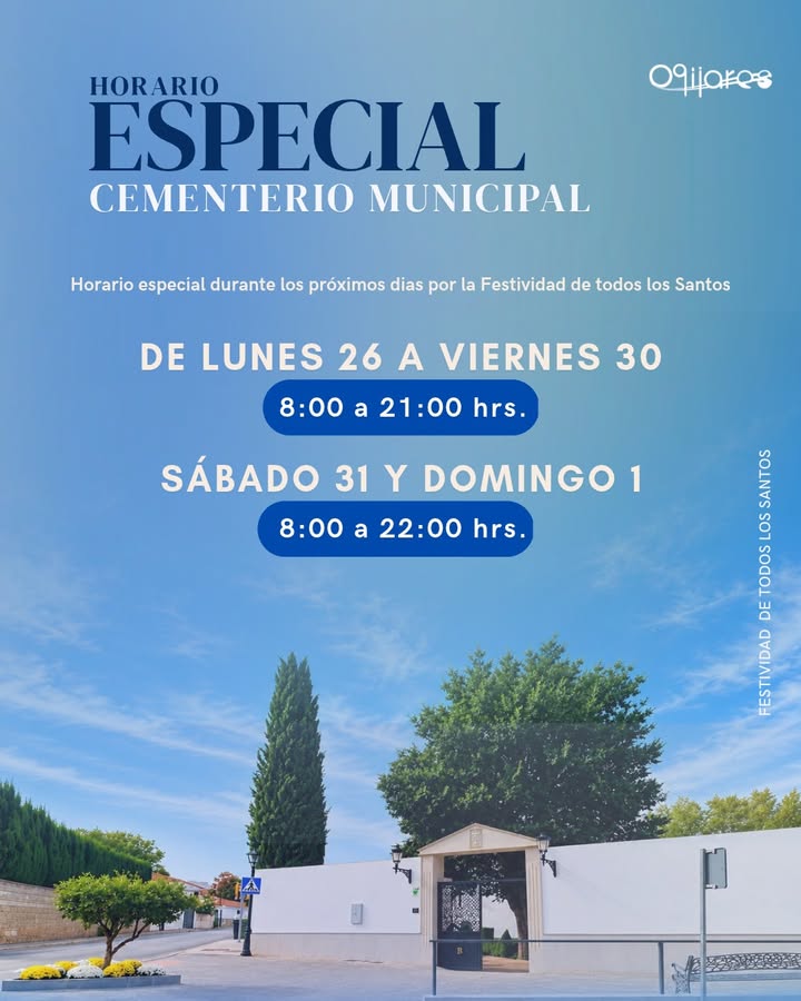 Cartel azul con el texto Horario especial cementerio municipal sobre una entrada de recinto amurallado con árboles.